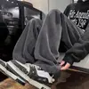 Pantalones de pana de peso pesado con forro polar, pantalones largos cálidos casuales y elegantes de corte holgado para hombre, directamente de fábrica, pantalones para hombre de calidad de exportación