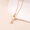 La Cadena para Clavícula Versátil Más Vendida de Amazon para Mujer, Color Dorado, No se Desvanece, Collar con Llave Estilo Antiguo, Collar con Cruz, Transfronterizo