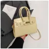 Bolsa Kelly Retrô Tendência Padrão Crocodilo para Mulheres 2026 Novo Modelo Moda de Alto Padrão Bolsa Transversal Versátil Platina