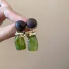 Aretes cuadrados torcidos de aguja plateada estilo simple de metal aretes geométricos diseño de nicho sentido de la moda para ir al trabajo combinables aretes al por mayor