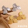 Pendientes Explosivos Elegantes de Moda Ins Europea y Americana, Nicho Creativo, Acero Inoxidable Chapado en Oro de 18K, Pendientes Boomerang de Personalidad para Mujer