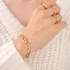 Conjunto de collar y pulsera con diseño de hip hop, estilo europeo y americano, con elementos geométricos apilados, cadena simple y descubierta, chapado en oro de 18 quilates y titanio.