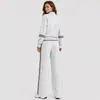Conjunto esportivo casual popular transfronteiriço europeu e americano para mulheres, com moletom com zíper e gola semi-alta e calça longa larga solta, conjunto de duas peças