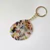 Llavero Peine Mini de Lámina de Acetato Coreana Colgante Lindo de Moda Peine Pequeño Antiestático Portátil Accesorio
