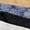 Tecido Jacquard Texturizado de Porcelana Azul e Branca Popular para Primavera e Outono, Camada Dupla com Padrões Florais Embossados, Estoque Disponível para Roupas e Calças