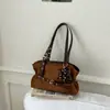 Bolsa feminina vintage transfronteiriça, nova moda outono 2026 nicho bolsa de ombro, bolsa de ombro de alta qualidade para o trabalho