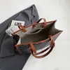 Bolso de gran capacidad de color de contraste para mujer 2023 nuevo estilo coreano estilo occidental portátil para el día a día bolso tote de textura de moda bolso de hombro para mujer
