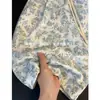 Shorts florales retro geniales para hombre, finos de verano, corte holgado, talla grande, estilo hawaiano, de seda helada, modernos, hasta la rodilla