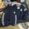 Conjunto de Duas Peças com Capuz Esportivo de Gola Redonda para Meninos Outono Primavera Infantil Novo com Listra Lateral Conjunto Casual Meninas
