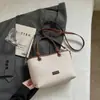 Bolsos populares para mujer de este año 2026 nueva versión coreana versátil bolso cruzado casual bolso de cubo de mano súper popular