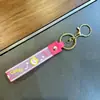 Llavero de Conejo de Gelatina de Caramelo Lindo Cuerda de Mano Correa de Mano Colgante Pegamento Pequeño Regalo Llavero de Pareja para Coche