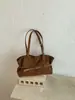 Tendência de moda transfronteiriça bolsa grande feminina nova casual retrô bolsa tote grande capacidade versátil para o dia a dia bolsa de ombro única moderna