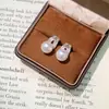 Pendientes de plata de ley S925 estilo francés, delicados y versátiles, con diamantes y perlas iridiscentes AKOYA en un diseño irregular en forma de C
