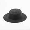 Sombrero plano de paja de hierba negra nuevo simple ligero de primavera y verano europeo y americano protección solar parasol sombrero plano de paja de viaje