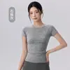Top de yoga sin costuras para mujer, de manga corta, tejido de una sola pieza, cuello redondo, entallado a la cintura, camiseta deportiva adelgazante, top de yoga de manga corta para Pilates