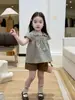 Roupa de Verão Nova Estilo para Meninas Shen Xuehui Shorts de Algodão Estilo Coreano para Bebês Camisa de Boneca Xadrez Fofa