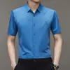Camisa de hombre para shake voice live verano nueva camisa casual de manga corta para hombre sin planchado alta elasticidad una generación de pelo