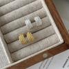 Pendientes de plata de ley S925 con diseño de círculos de alta gama con giro coreano, temperamento retro francés, combinables con todo.