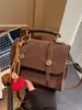 Bolso de Gama Alta de Nicho Estilo Británico Maillard 2026 Bolso Cruzado de Moda Nueva Bolso de Mano Texturizado Bolso Cuadrado Pequeño para Mujer