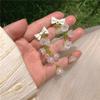 Pendientes Lilu ~ Pendientes largos con borlas para mujer, estilo pastoral Mori con lazo verde, pendientes con cuentas y clip para las orejas.
