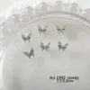 Nuevo Versátil Francés Mariposa Arte de Uñas Accesorios de Pedrería Estilo Coreano Color Sólido Alta Calidad Mariposa Pedrería Material para Uñas Venta al por Mayor