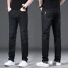 Jeans de Primavera, Verano y Otoño para Hombre Rectos Holgados Elásticos de Cintura Media Pantalones Largos Venta al por Mayor Exportación Pantalones de Hombre