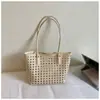2026 Nova Bolsa Tote Elegante Simples Vazada Transfronteiriça, Bolsa de Ombro Casual Versátil para Mulheres, Bolsa Feminina de Grande Capacidade