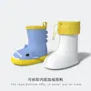 Botas de lluvia de tiburón de venta caliente transfronterizas para niños, venta al por mayor de comercio exterior, zapatos de agua ligeros antideslizantes para niños y niñas en la temporada de lluvias, adecuados para estudiantes de jardín de infantes