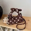 Bolso de mano de gamuza para mujer, nuevo modelo de otoño 2026, de alta gama, vintage, Maillard, para la ciudad, de hombro y cruzado
