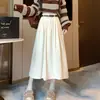 Falda midi de pana con sentido del diseño para mujer, nueva, retro, de cintura alta, adelgazante, de longitud media, con temperamento, de gran vuelo, línea A, versión coreana