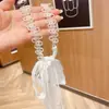 Collar de perlas de hadas de doble uso, banda para el cabello, cinta para el cabello para mujer, cadena para clavícula, elegante, popular en Internet, nueva banda para el cabello de verano, tocado