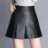 Pantalones falda de cuero para mujer 2026 otoño e invierno PU falda pantalón corta ajustada falda pantalón de cuero de dos piezas falsas pantalones de bota rectos cintura alta adelgazante