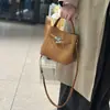 Bolso pequeño tipo cubo de piel de vaca de primera capa para mujer, Bolso de mano de alta gama para el trabajo, Bolso de hombro de piel de vaca Togo, Bolso cruzado para el trabajo