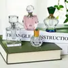 Venda Direta de Fábrica de Frascos Vazios de Óleo Essencial de Cristal de Alta Transparência, Frascos Colecionáveis Modernos e Simples, Selados e à Prova de Vazamentos, Frascos Vintage para Dosagem de Óleo Essencial