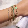 Pulsera de Acero Inoxidable Chapado en Oro de 18K con Diseño de Trébol de Cuatro Hojas y Goteo de Aceite, Estilo Tranquilo y Dulce para Mujer, Joyería Transfronteriza de Lujo Ligero con un Diseño Único