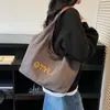 Bolso de Lona de Nicho Nuevo Transfronterizo 2026 para Mujer, Bolso de Hombro Versátil de Gran Capacidad, Bolso Tote Casual para Estudiante