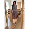 Nuevo falda midi versátil de lunares abombada vintage de otoño con botones y diseño único
