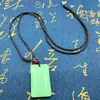 Colgante de collar de marca segura de jade Hetian imitación verde esmeralda marca pan marca sin importar colgante venta al por mayor