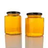 Botella hexagonal de miel, botella de vidrio para salsa, botella de salsa picante, botella de mermelada, lata sellada de múltiples especificaciones