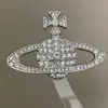 Broche de Saturno Exquisito em Liga Metálica com Strass, Luxo Acessível, Alta Qualidade, Corsage com Design Personalizado, Joia Elegante e Versátil para Mulheres