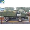 Huerto doméstico pequeño con vehículo excavador agrícola micro excavación carga y transporte en un vehículo excavadora