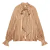 Fabricante de ropa de mujer transfronterizo al por mayor 2026 nueva camisa de moda casual estilo europeo y americano con detalle de lazo y textura de satén de seda