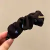 Nuevo y exquisito pasador de pelo con lazo 2026, un accesorio lujoso y de alta gama, con un diseño de pinza de plátano estilo coreano, creando un look dulce y moderno para mujeres