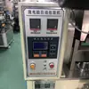 Máquina de embalagem para trailers, Máquina de embalagem com balde de corrente para nozes de Guangzhou, Máquina de selagem de máquina de embalagem vertical com despejo automático