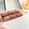 Modernos Pendientes Nuevos Versátiles en Forma de Corazón, Simples y Elegantes, Pendientes de Lujo Exquisitos de Alta Gama al por Mayor para Mujer