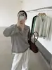 Suéter de punto de lana ultrafina estilo coreano con solapa y manga larga, tipo dos piezas falsas para mujer, modelo nuevo de otoño 26, holgado y versátil para ir al trabajo