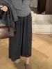 Falda midi plisada de punto gris que reduce la edad para mujer, nueva colección otoño/invierno 2026, moderna y versátil, con un bajo ancho y fluido