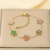 Pulsera de moda de margarita transfronteriza, lujo ligero con un toque de alta gama, flor de cinco pétalos con incrustaciones de diamantes de colores, joyería de acero inoxidable para mujer