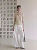 Top de verano para mujer de punto transpirable de manga corta con cuello polo beige estilo 'old money' francés, con un diseño de alta gama, adelgazante y que ciñe la cintura