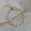 Pulsera de cristal con cuentas de flor de circón fresco, pulsera de lujo ligero de alta gama, joyería pequeña dulce versátil al por mayor
